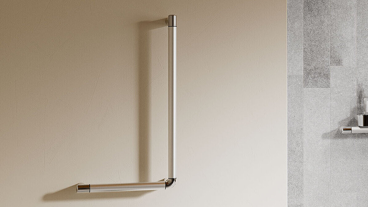 Erlau brand 90° angle handle in an elegant high-gloss anodised finish on a beige wall